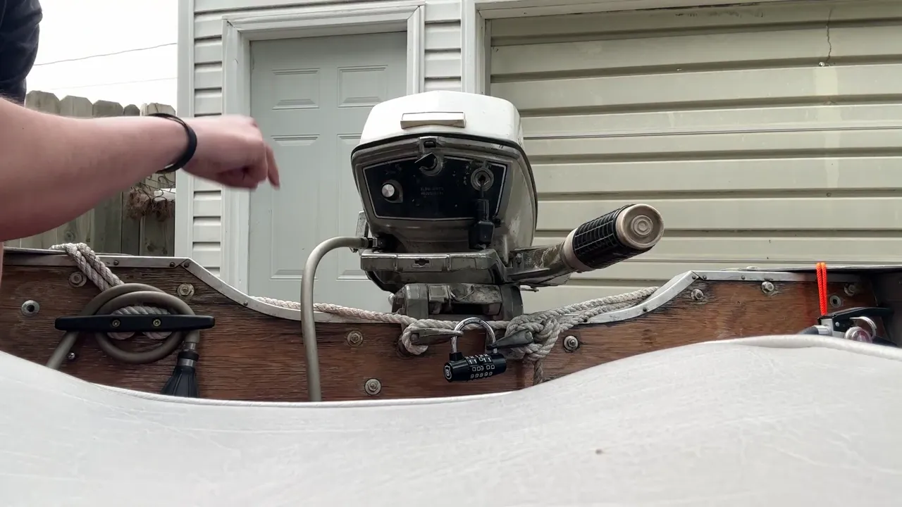 Pull starting a 1972 Johnson outboard on a boat
