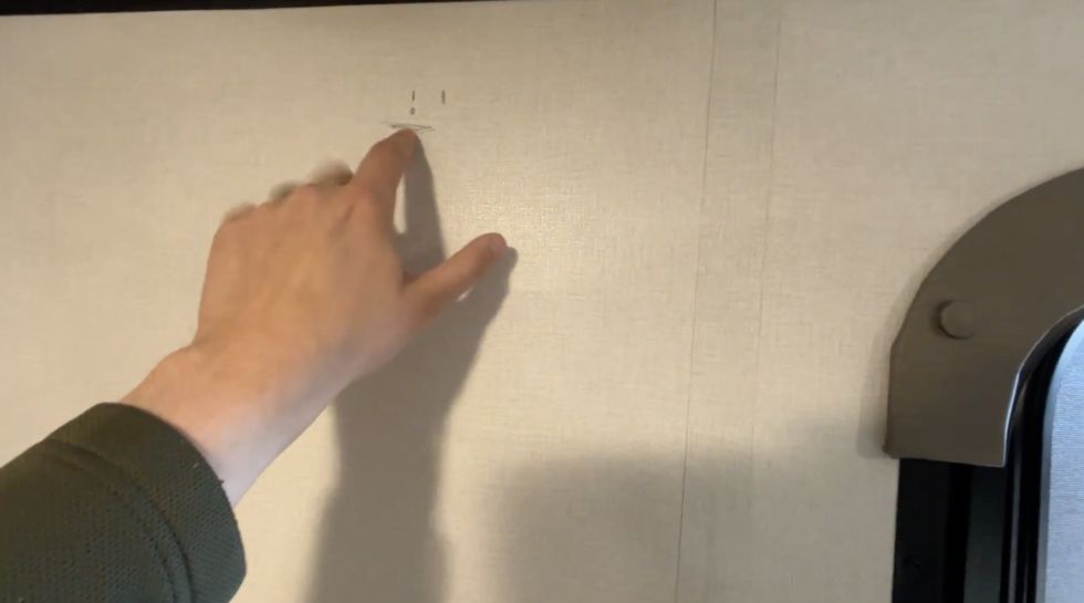 Checking placement on the trailer wall